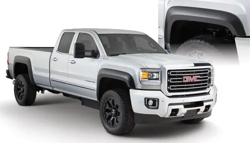 Bushwacker 15-18 GMC Sierra 2500 HD Extend-A-Fender Style Flares 4pc 78.8/97.6in Bed - Black New Arrival